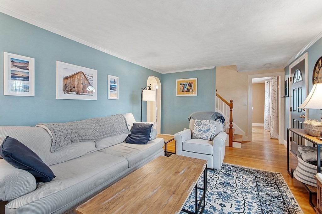 8 Gardner Road Reading, MA 01867 - Photo 5 of 35 a living room with furniture and a couch