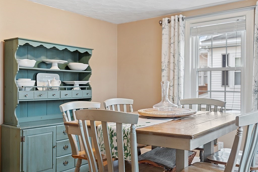 8 Gardner Road Reading, MA 01867 - Photo 7 of 35 a view of a dining room with furniture and window