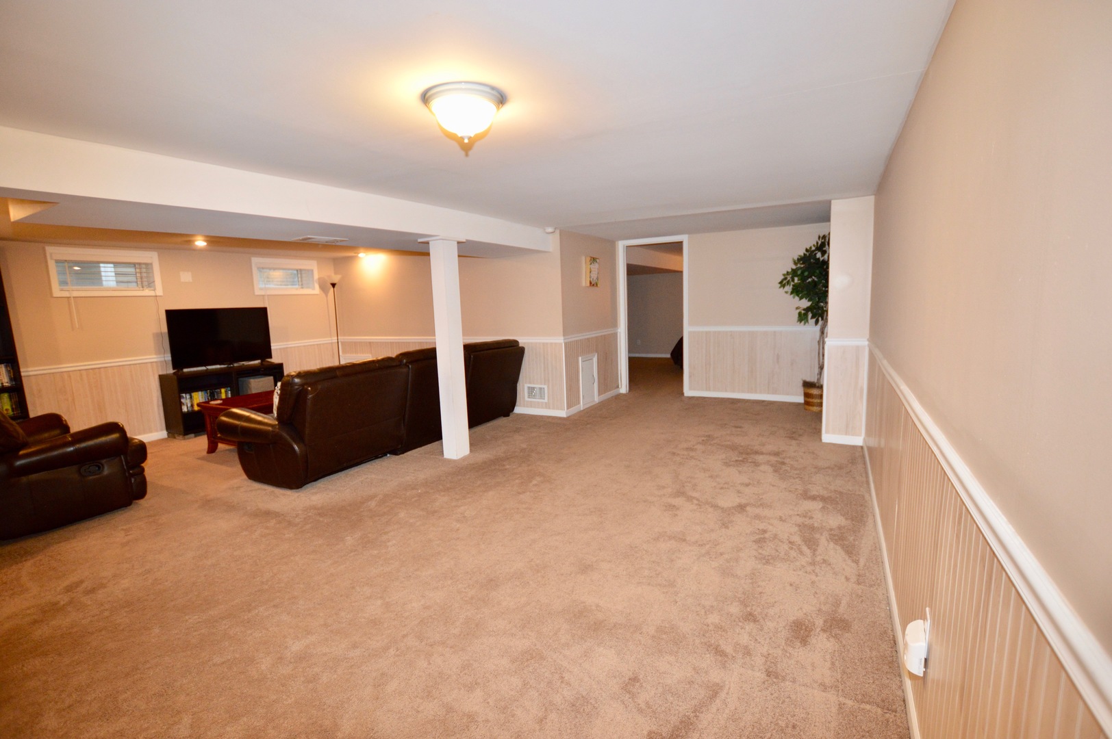 385 Willow Road Wauconda, IL 60084 - Photo 14 of 22 a view of a livingroom with furniture and kitchen area