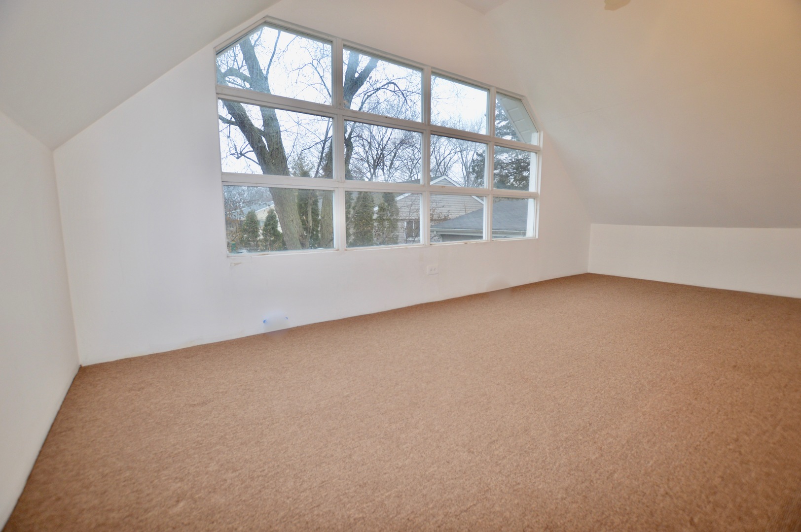 385 Willow Road Wauconda, IL 60084 - Photo 22 of 22 an empty room with a window