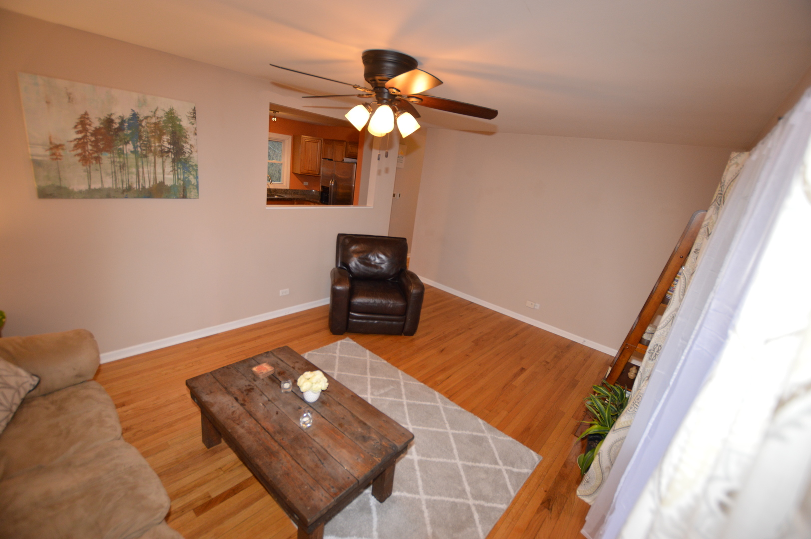 385 Willow Road Wauconda, IL 60084 - Photo 4 of 22 a living room with a couch