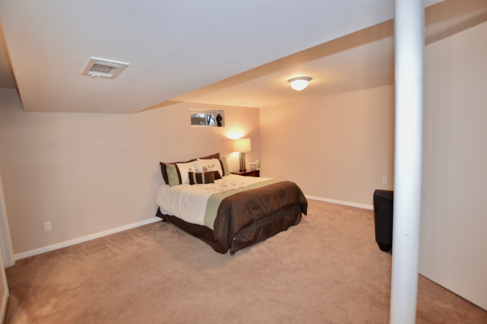385 Willow Road Wauconda, IL 60084 - Photo 10 of 22 a bedroom with a bed and a night stand