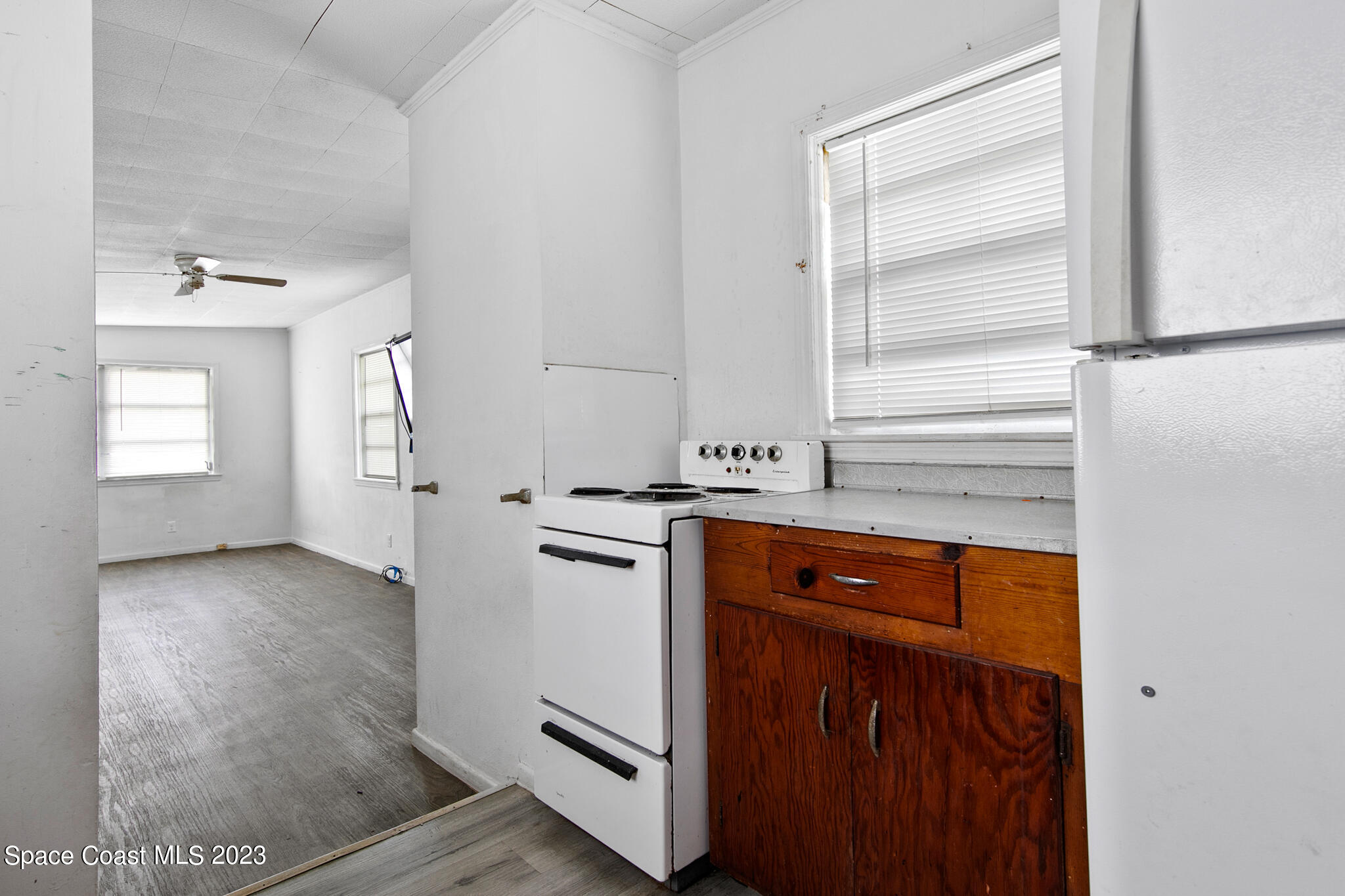 877 Sunset Drive Melbourne, FL 32935 - Photo 14 of 49 a view of a kitchen with a sink