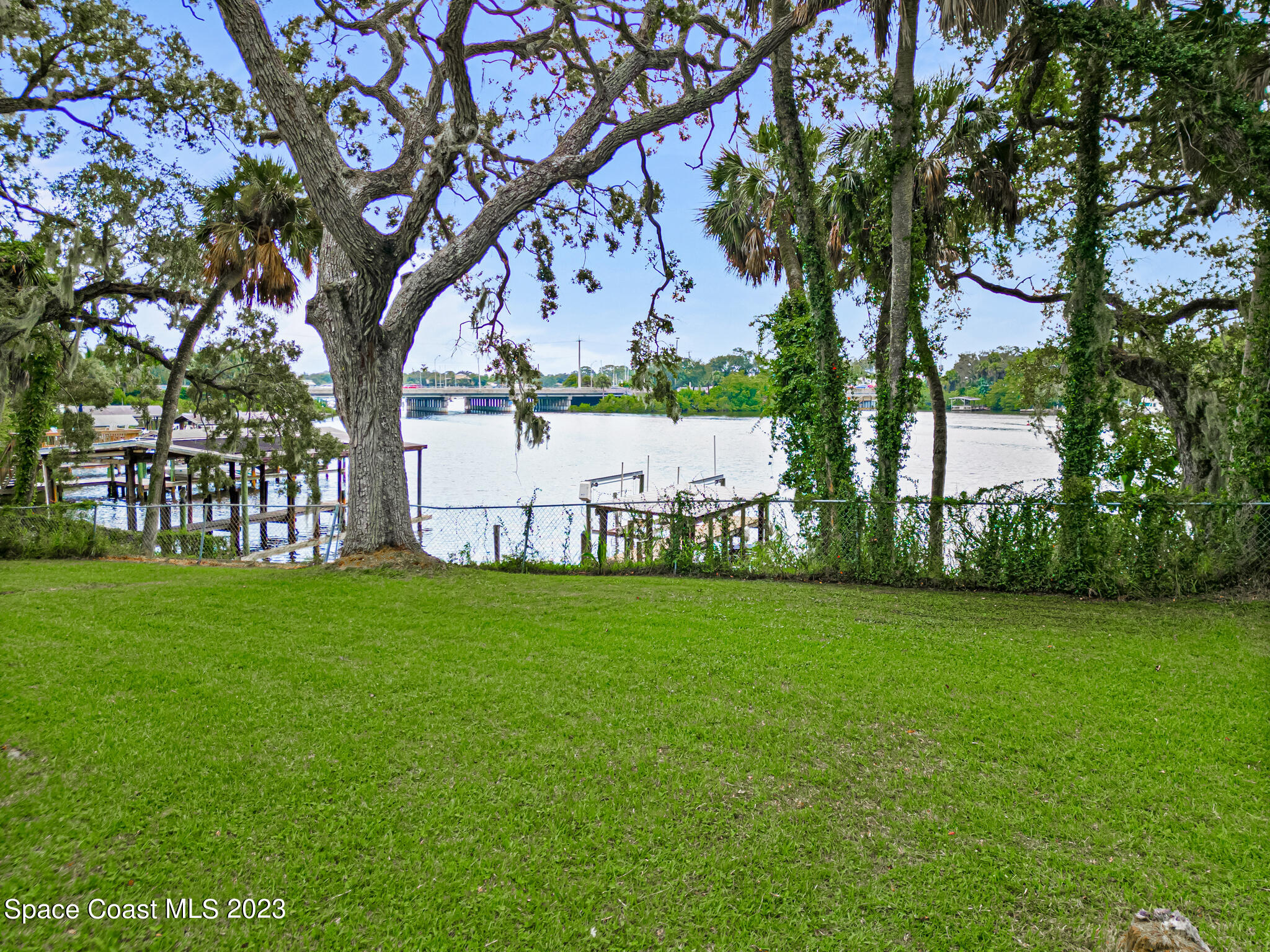 877 Sunset Drive Melbourne, FL 32935 - Photo 7 of 49 a view of a park next to a large trees