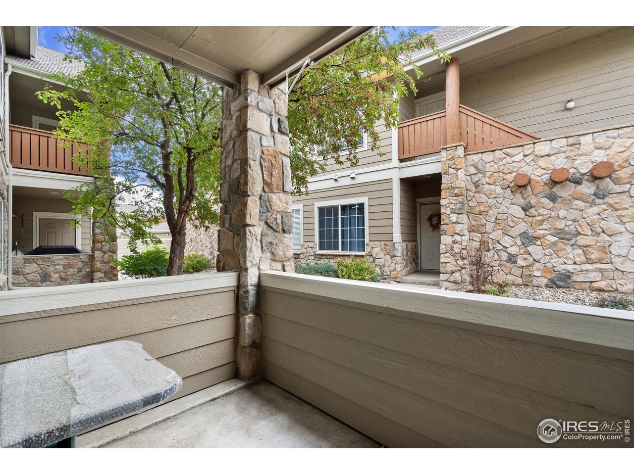 1343 Lake Circle, Unit B Windsor, CO 80550 - Photo 18 of 22 Private patio - morning coffee spot or evening wind-down zone