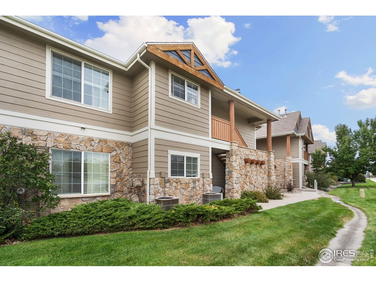 1343 Lake Circle, Unit B Windsor, CO 80550 - Photo 3 of 22 End-unit location - quiet and easy to access.