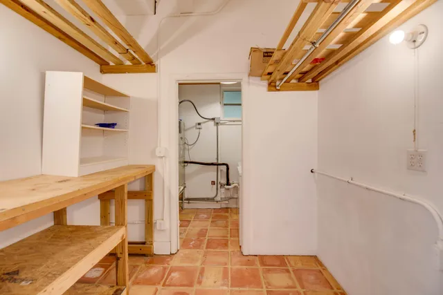 a view of a balcony with wooden fence