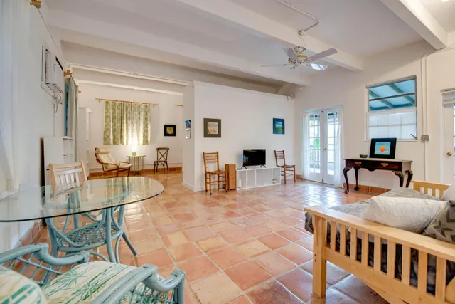 a living room with furniture and a table