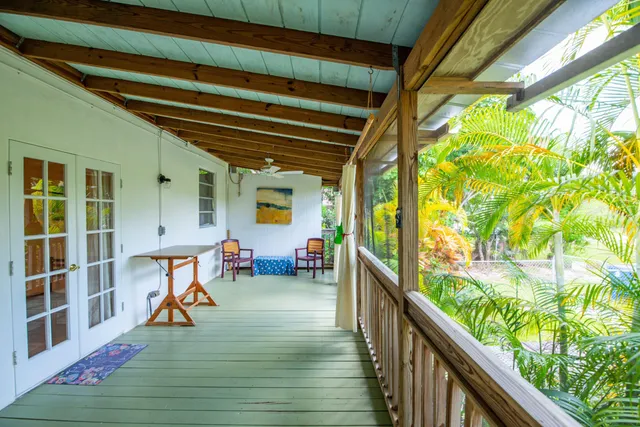 a view of swimming pool with seating area