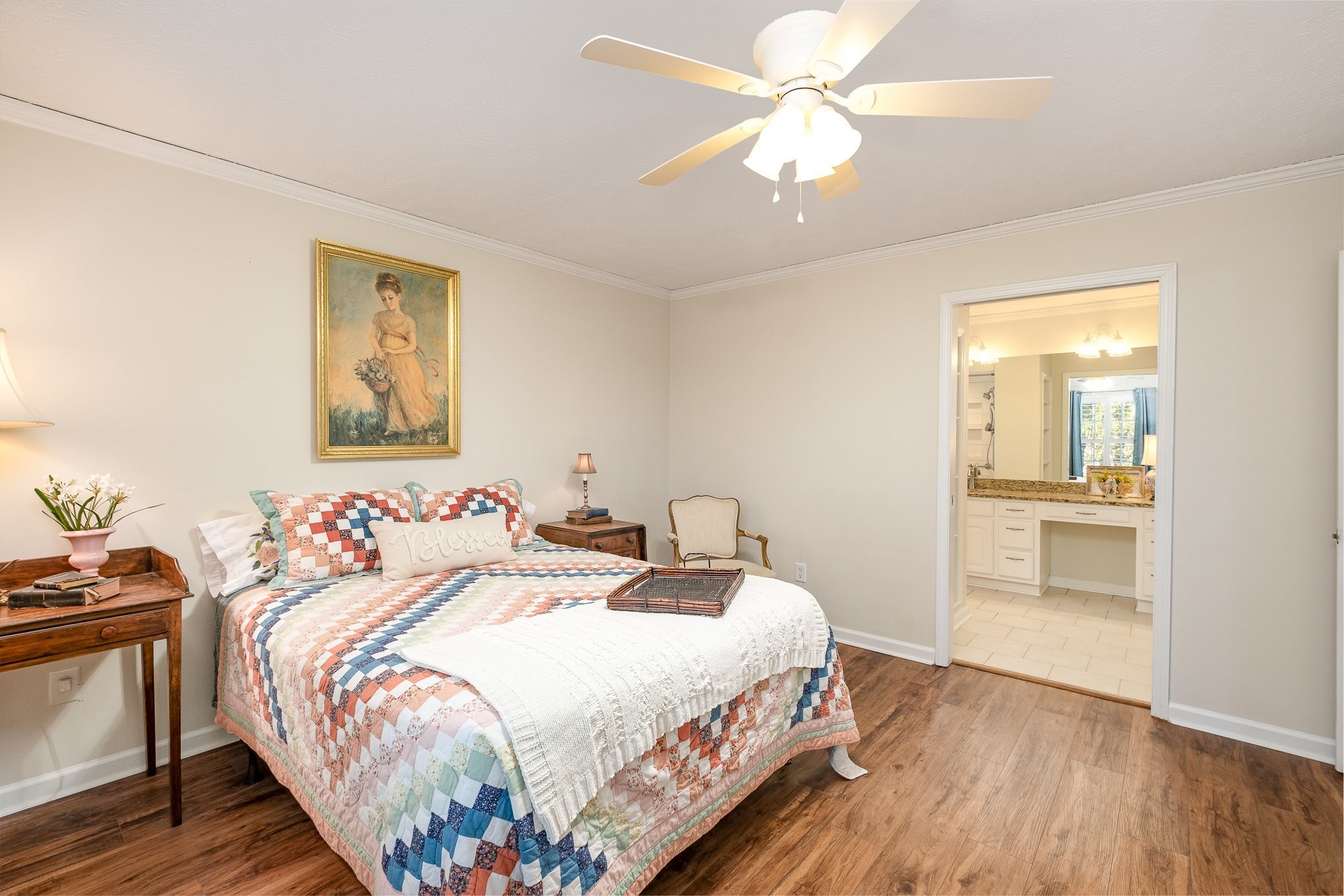 4360 Scott Hollow Road Culleoka, TN 38451 - Photo 18 of 29 a bedroom with a bed and a chandelier
