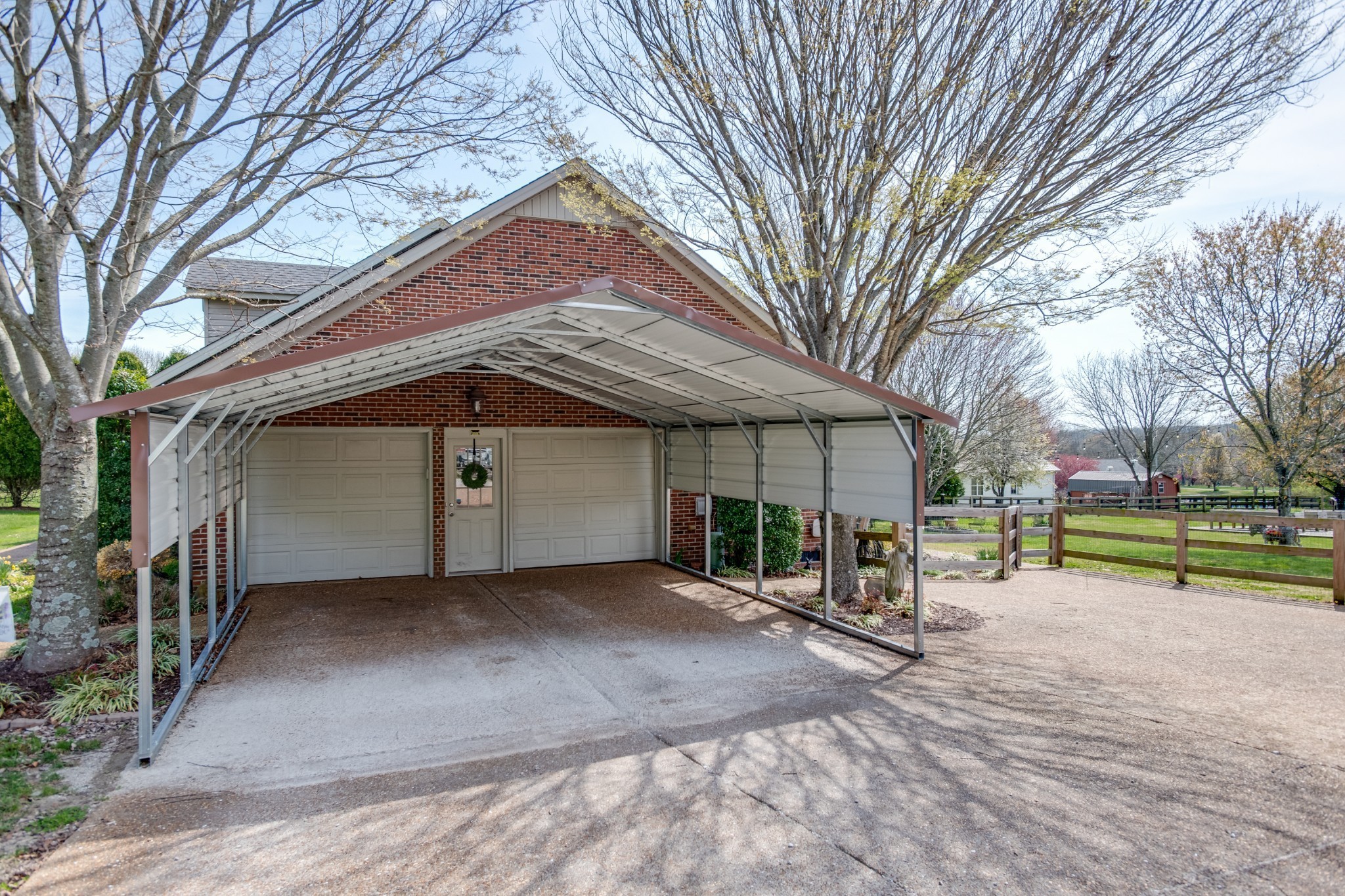 4360 Scott Hollow Road Culleoka, TN 38451 - Photo 8 of 29 a view of a house with a yard and garage