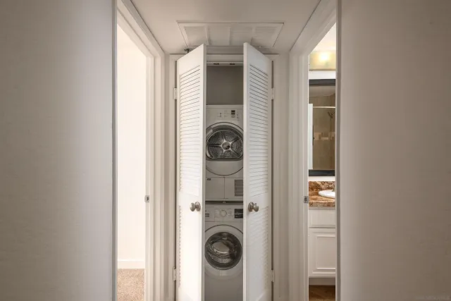 a view of entryway with washer and dryer