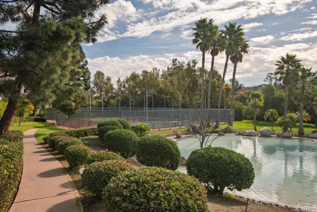 a view of a lake with a house