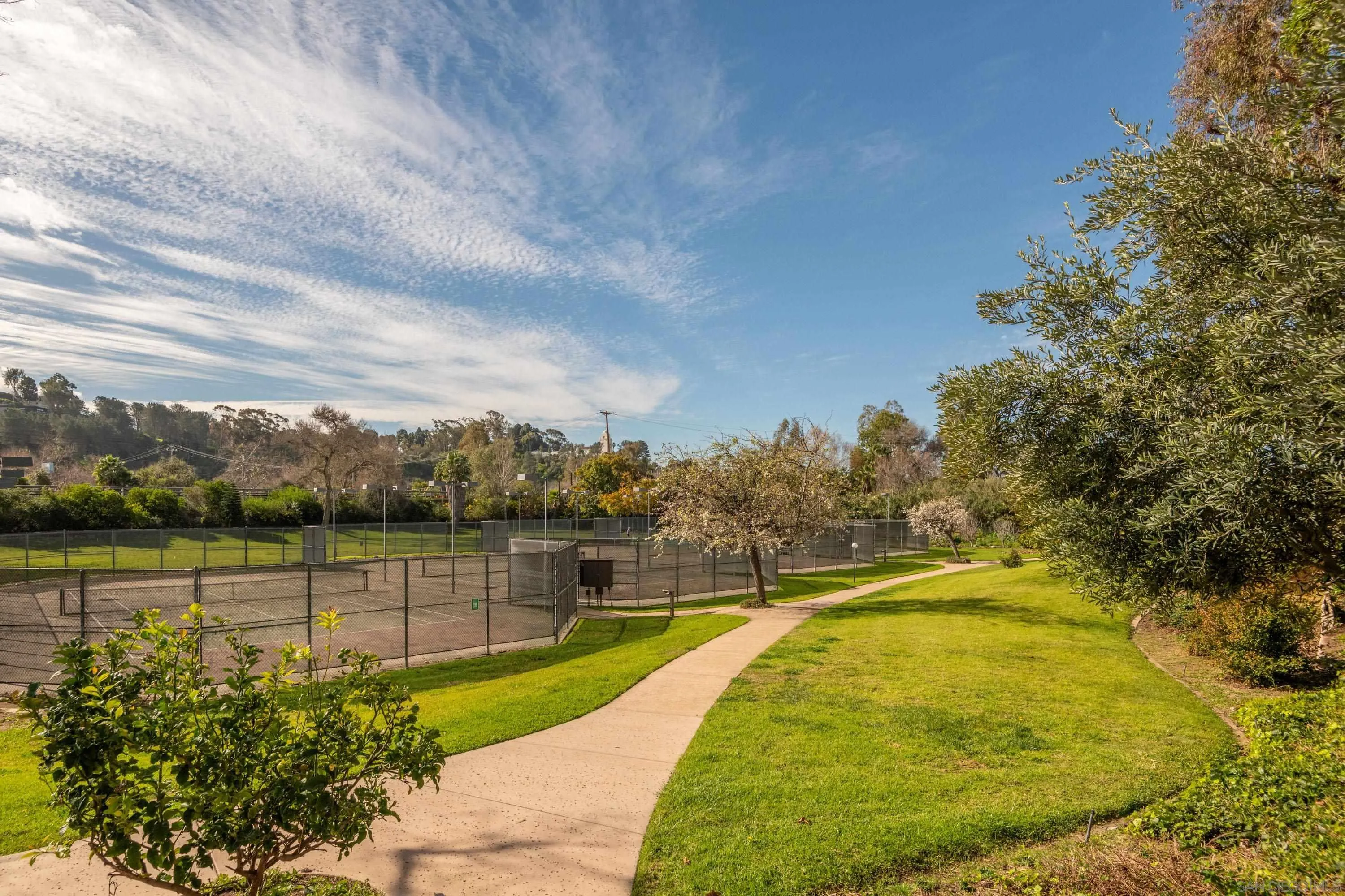 5705 Friars Road, Unit 54 San Diego, CA 92110 - Photo 26 of 30 a view of swimming pool with lake and mountain in the back