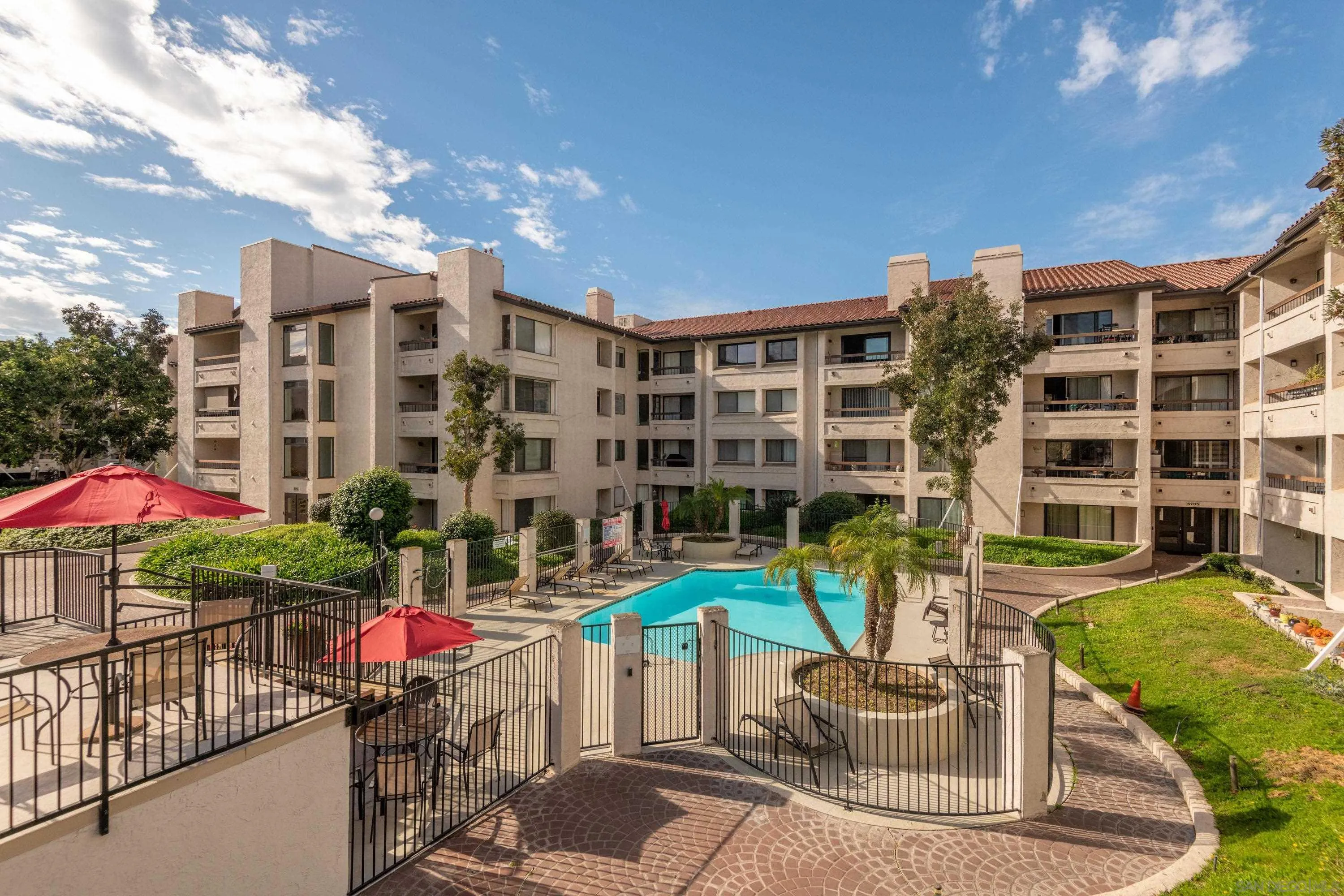 5705 Friars Road, Unit 54 San Diego, CA 92110 - Photo 30 of 30 a view of building with outdoor seating