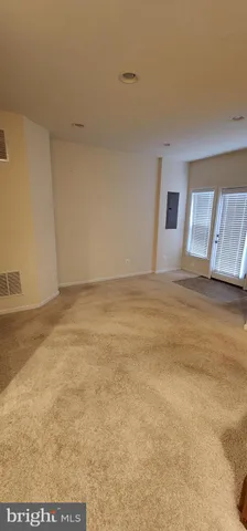 a view of an empty room with window