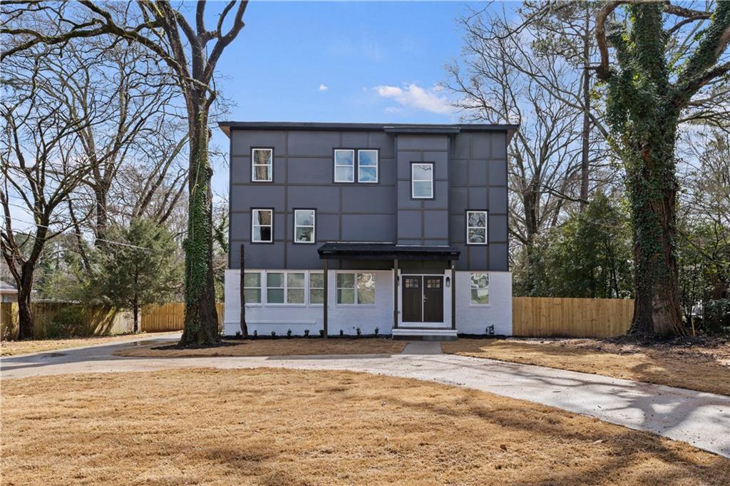2543 McAfee Road Decatur, GA 30032 - Photo 1 of 1 a front view of a house with a yard