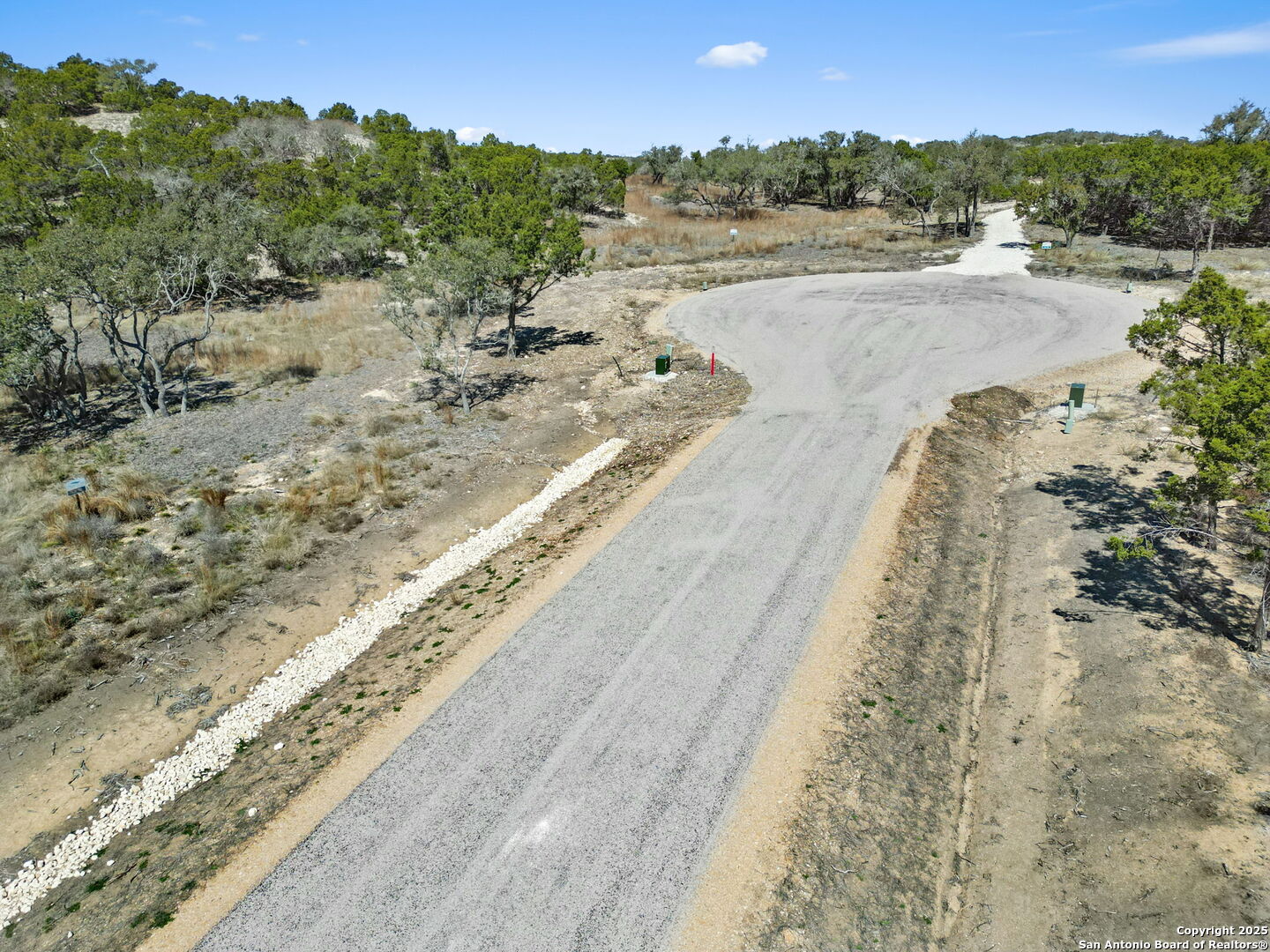 Tbd Citadel Center Point, TX 78010 - Photo 16 of 22 a view of a lake with trees and houses in the background