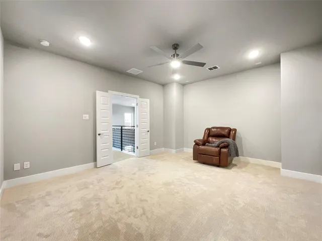 a bedroom with bed and a window