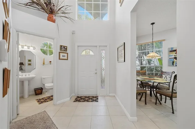 a very nice looking dining room with a table and chairs