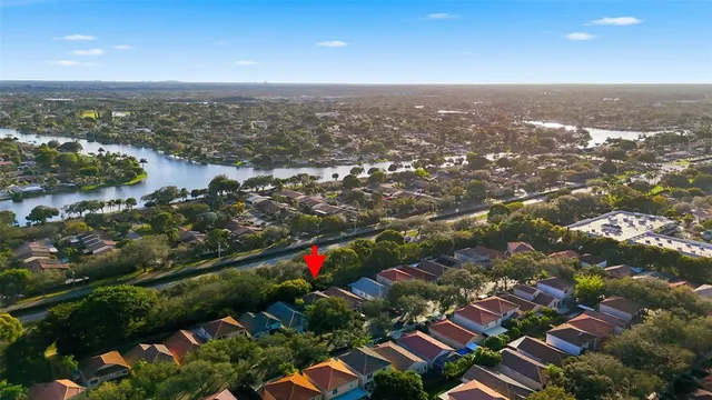 an aerial view of city and lake