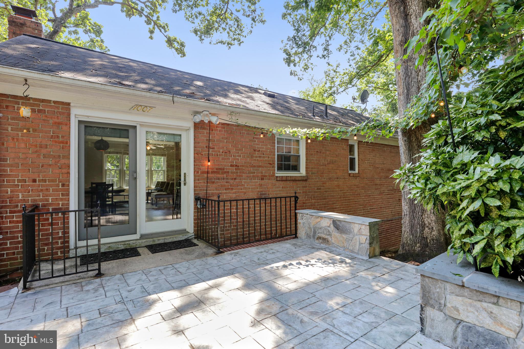 1007 West Braddock Road Alexandria, VA 22302 - Photo 5 of 55 a view of a porch with a bench in patio