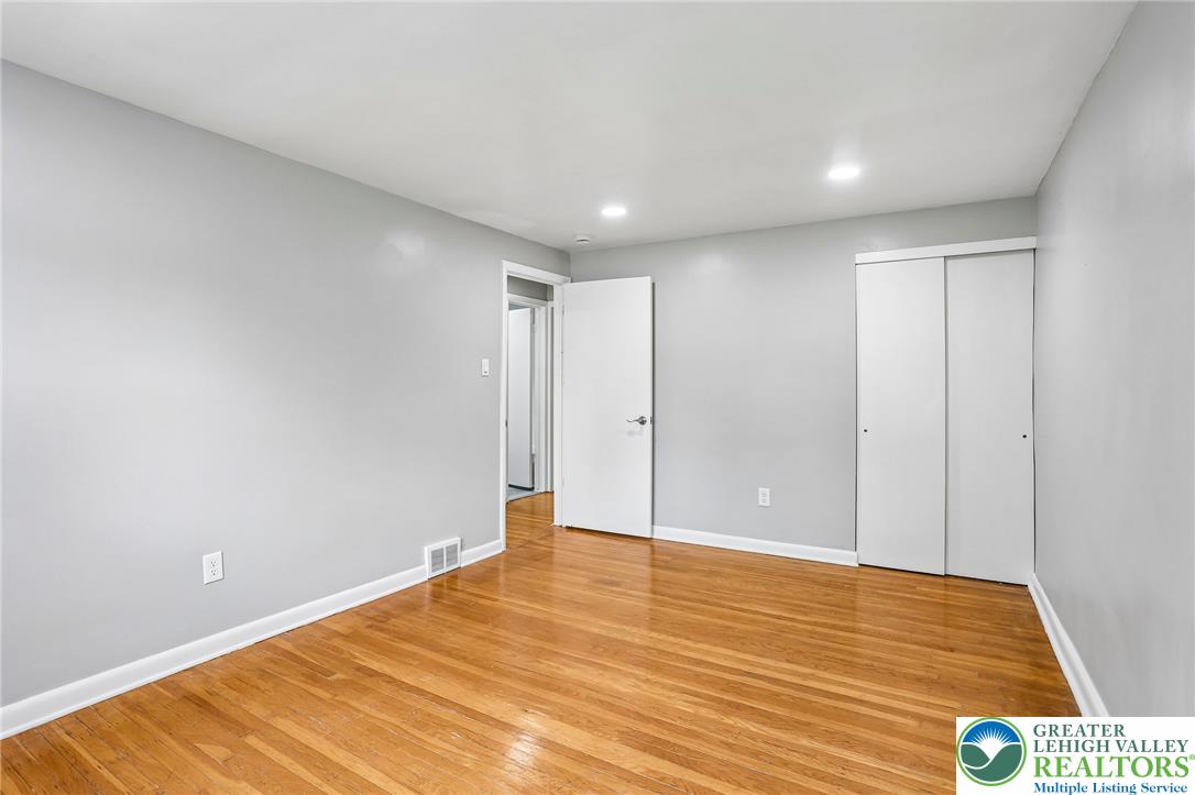 4008 Powell Road Brookhaven, PA 19015 - Photo 18 of 36 Hardwood flooring extends through this generously proportioned bedroom with ample closet space.