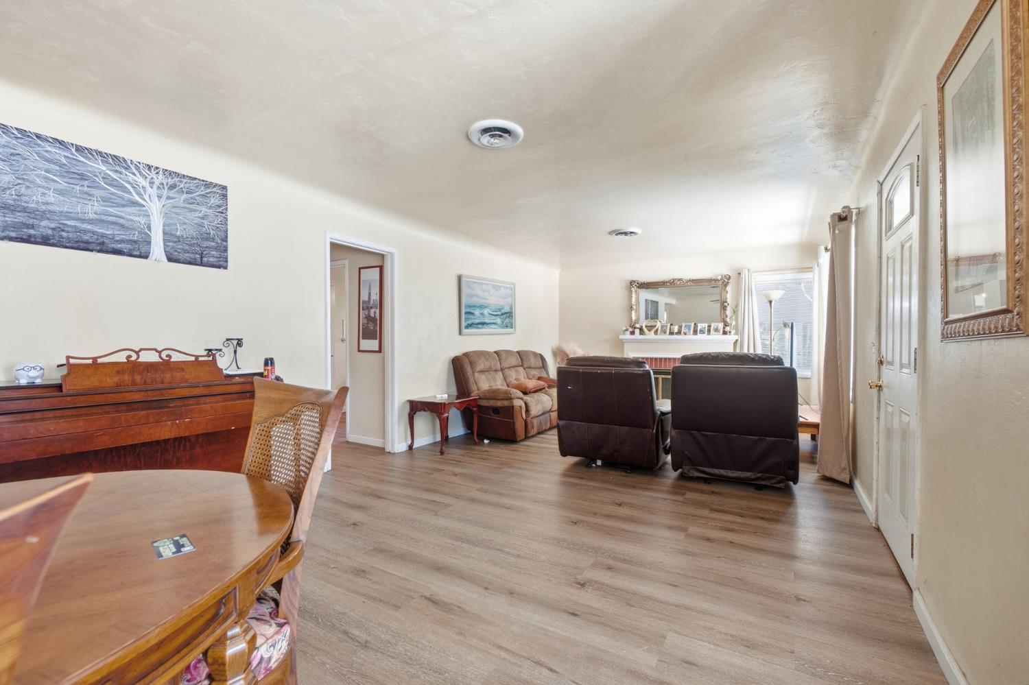 1705 Stetson Avenue Modesto, CA 95350 - Photo 10 of 32 a bedroom with furniture and wooden floor