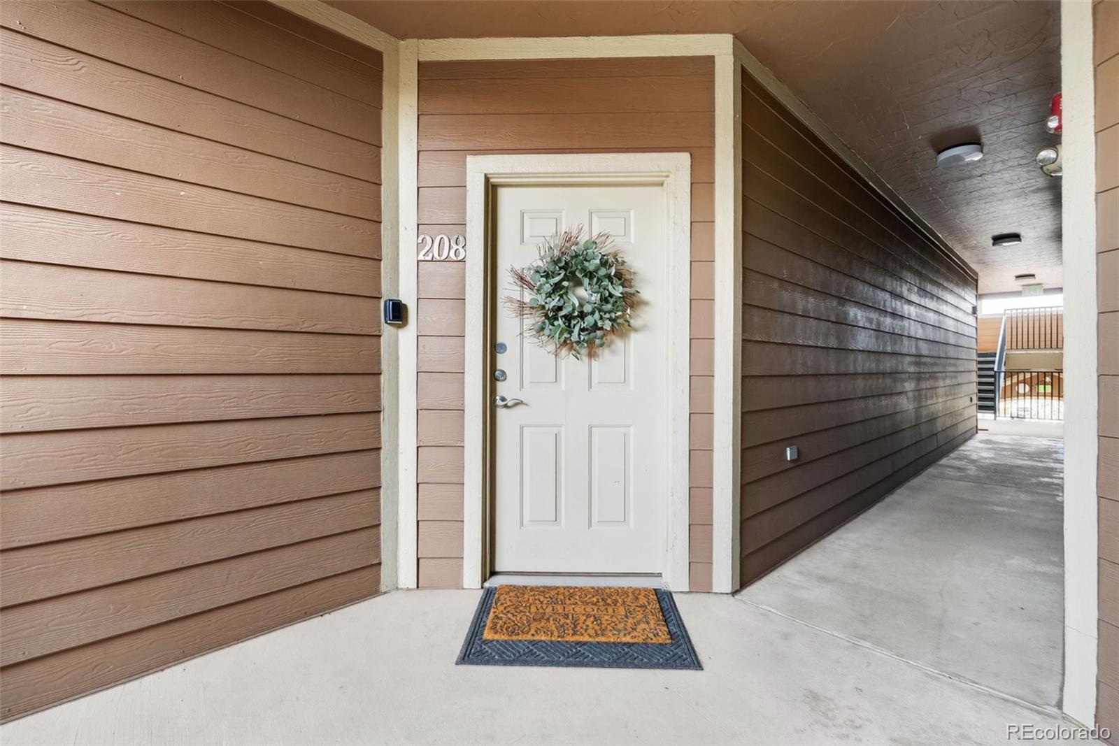 10733 Twenty Mile Road, Unit 208 Parker, CO 80134 - Photo 2 of 42 a view of outdoor space and garage