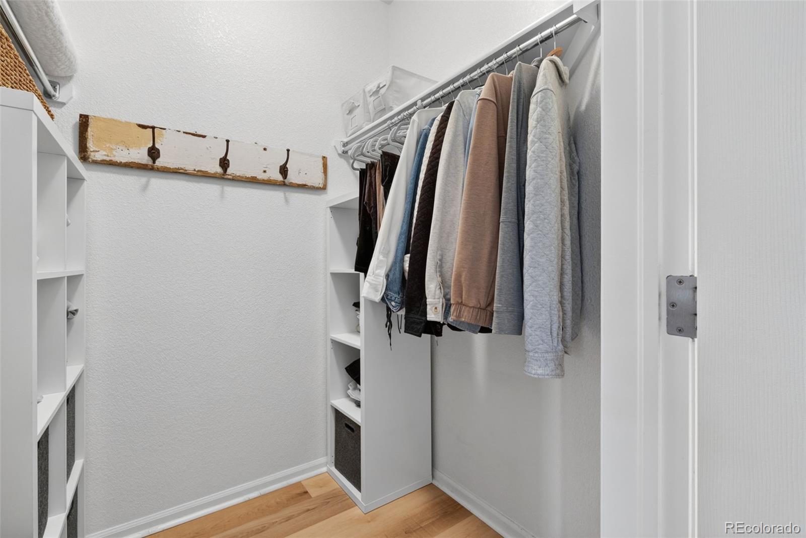 10733 Twenty Mile Road, Unit 208 Parker, CO 80134 - Photo 26 of 42 a view of walk in closet with clothes and shoes