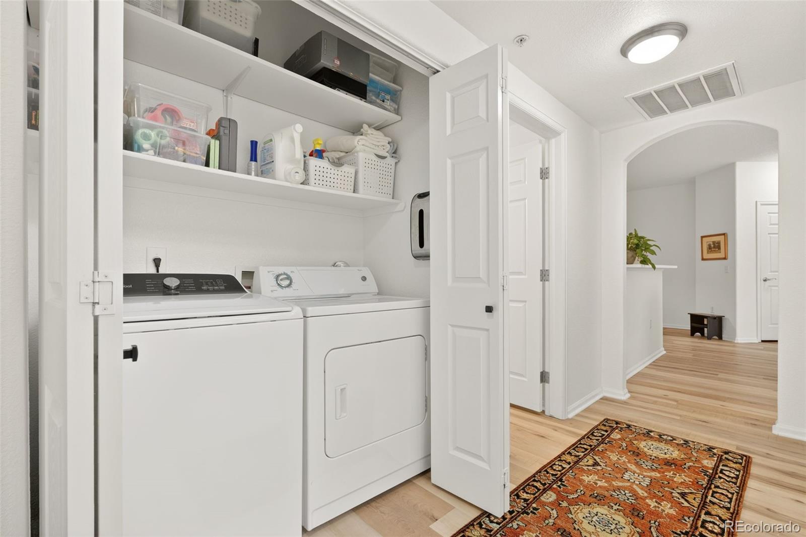 10733 Twenty Mile Road, Unit 208 Parker, CO 80134 - Photo 27 of 42 a room with storage and utility