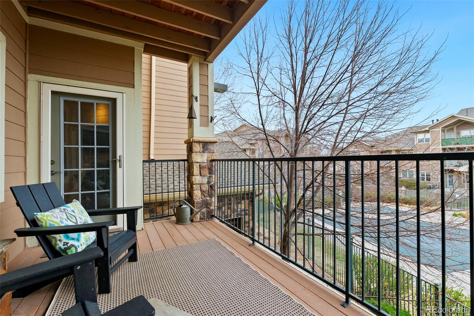 10733 Twenty Mile Road, Unit 208 Parker, CO 80134 - Photo 29 of 42 a view of a balcony with furniture