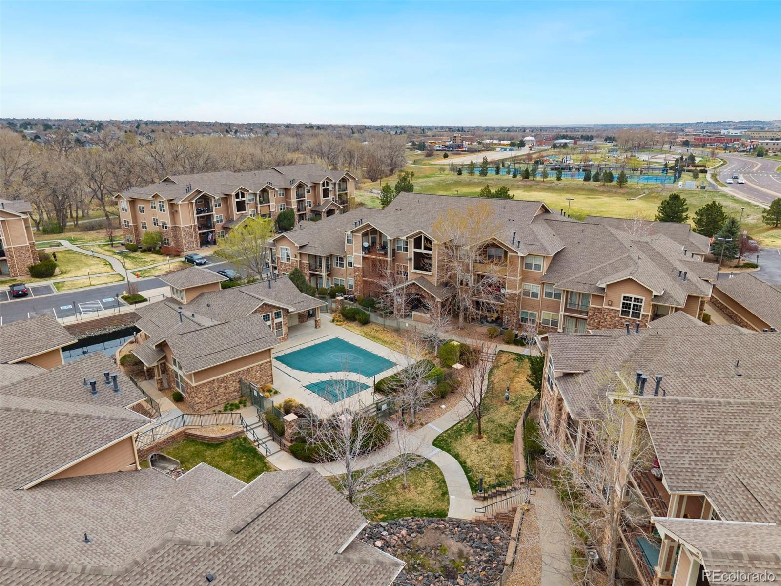 10733 Twenty Mile Road, Unit 208 Parker, CO 80134 - Photo 37 of 42 an aerial view of a residential houses with outdoor space and ocean view