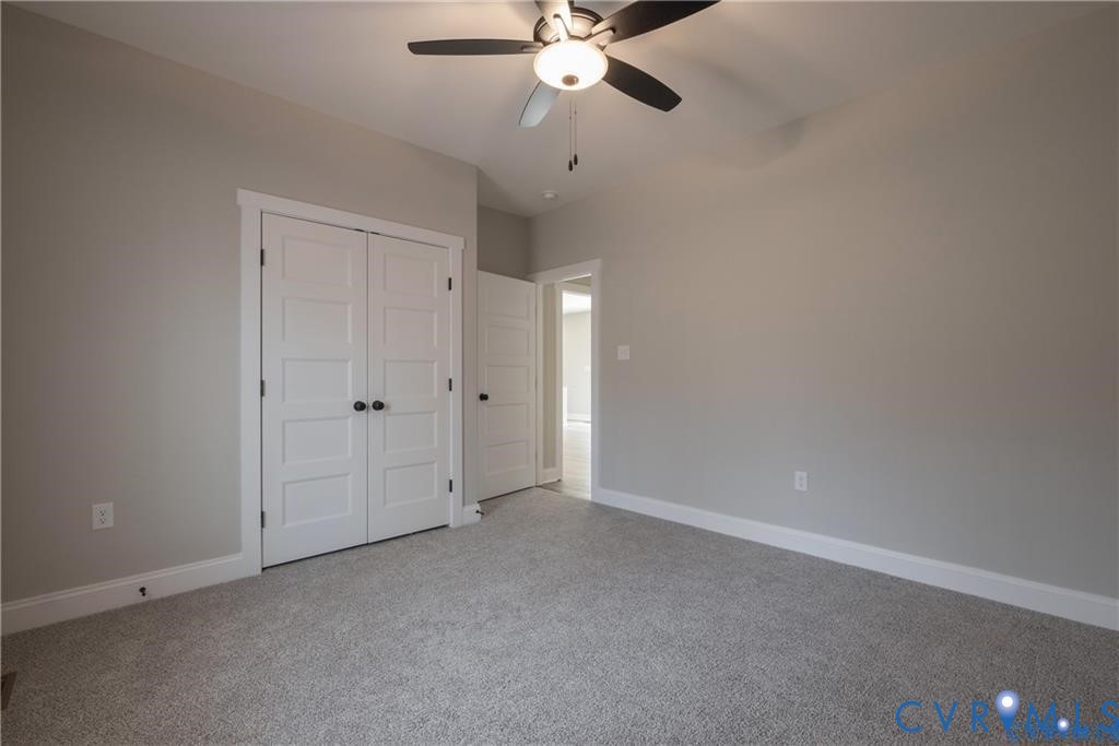 2223 Ridge Road Arvonia, VA 23004 - Photo 25 of 32 Spacious room featuring neutral carpeting, light g