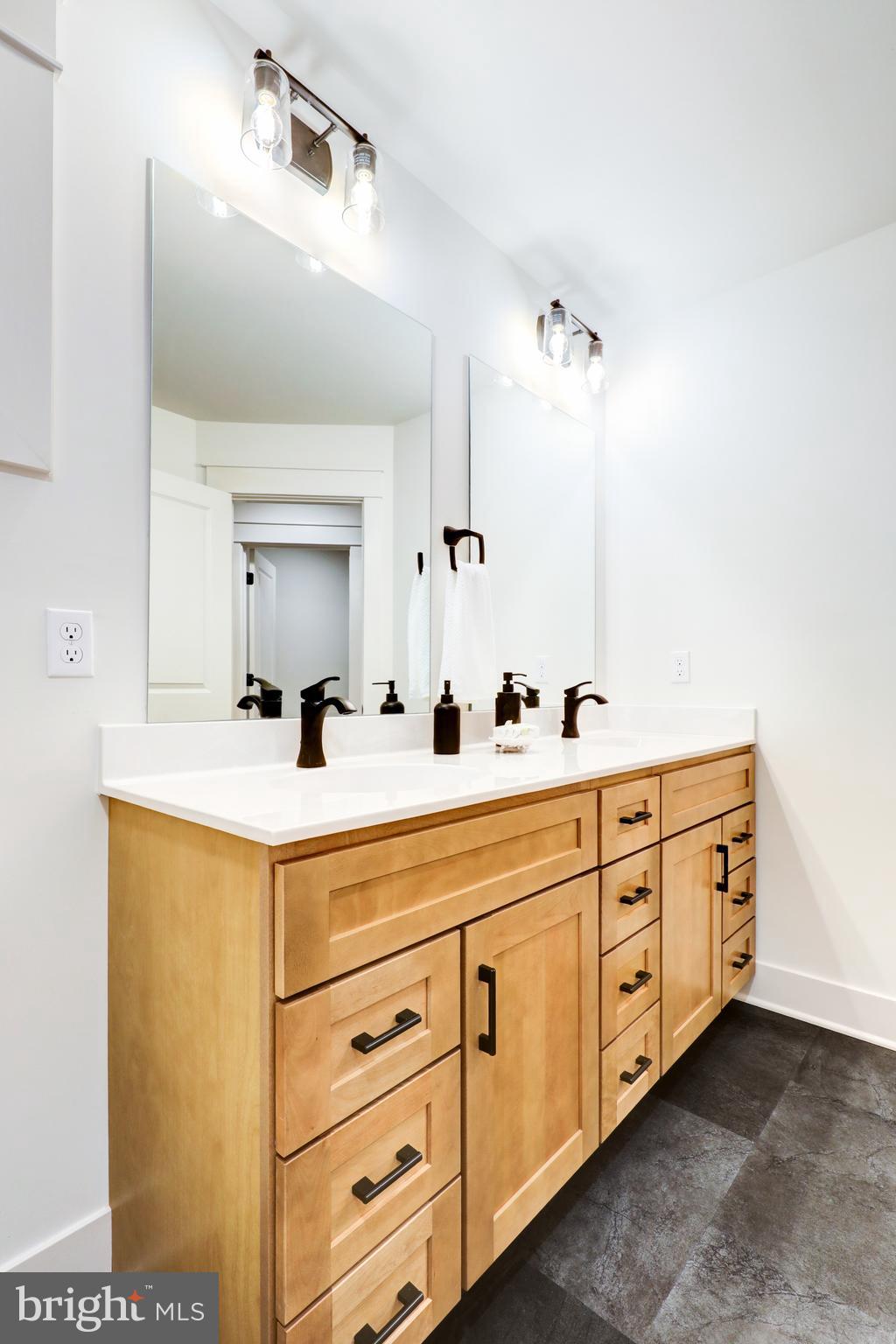 218 Parkside Place Lancaster, PA 17602 - Photo 29 of 48 a spacious bathroom with double sink and a mirror