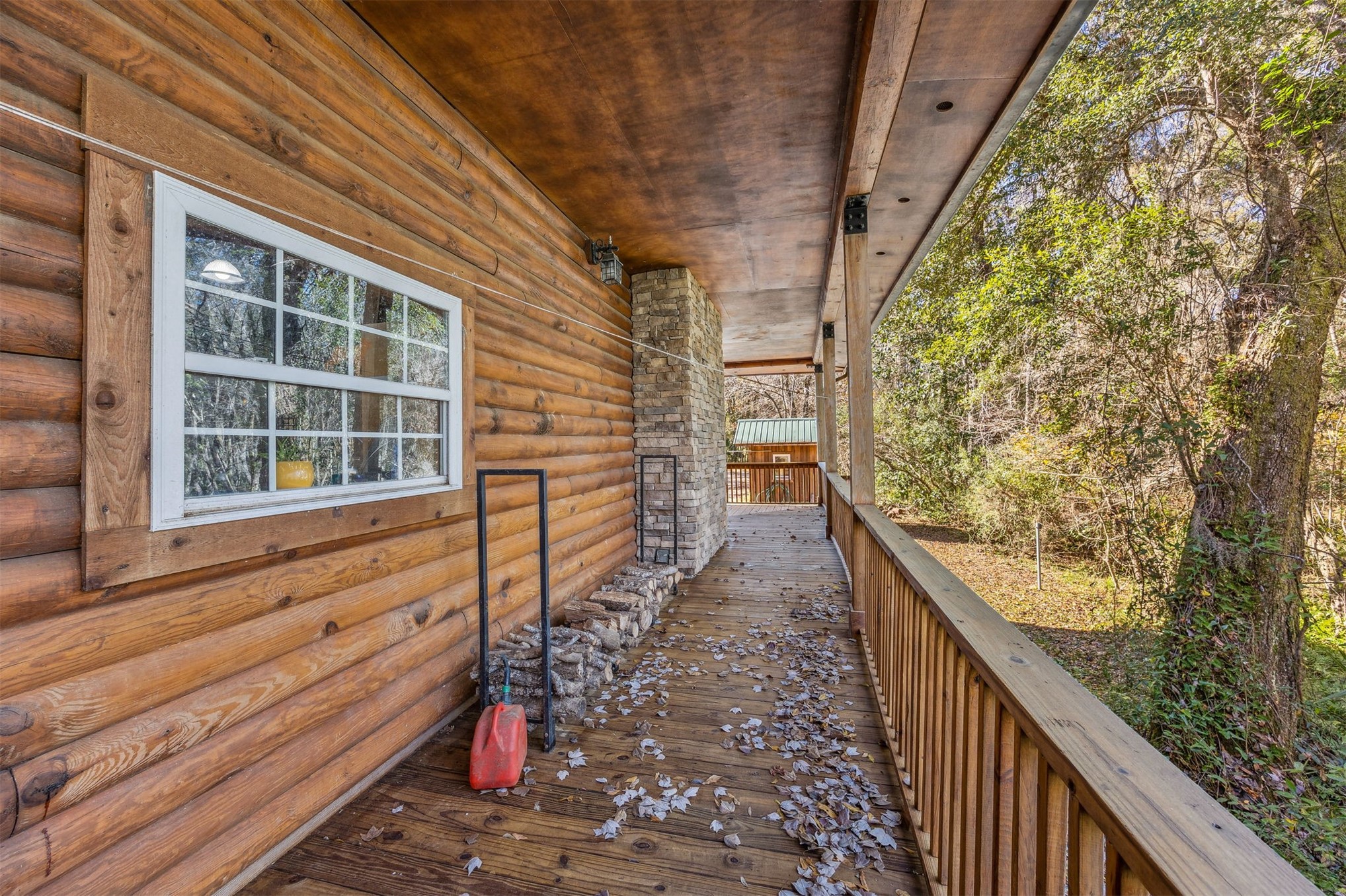 86205 Pages Dairy Road Yulee, FL 32097 - Photo 41 of 56 a view of a balcony with wooden floor and fence