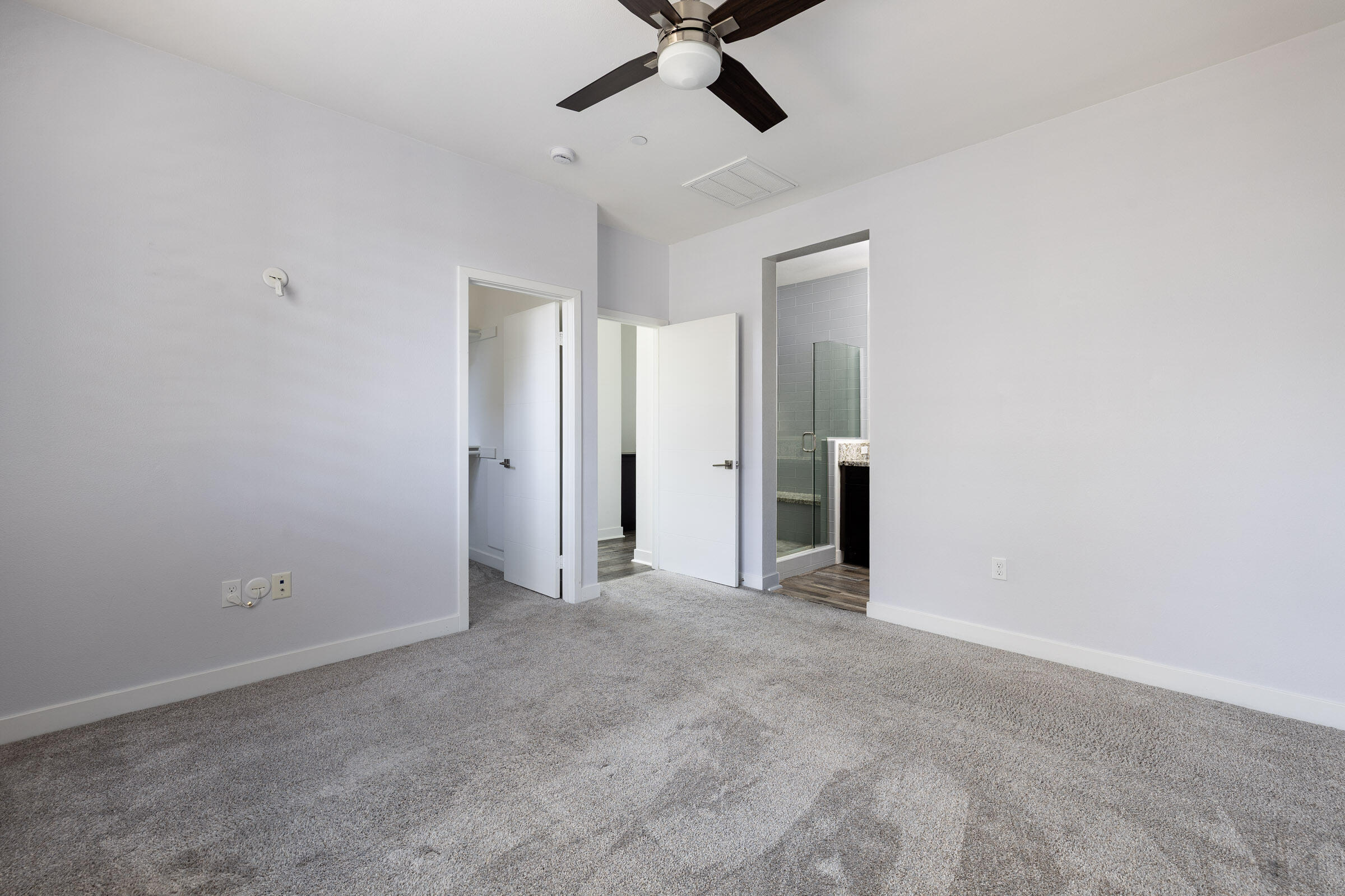 5685 Surfrider Way, Unit 105 Goleta, CA 93117 - Photo 22 of 29 Primary Bedroom to Bath