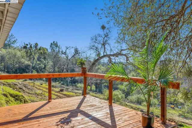 a view of a balcony with mountain view