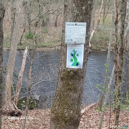 a sign that is on the side of a road