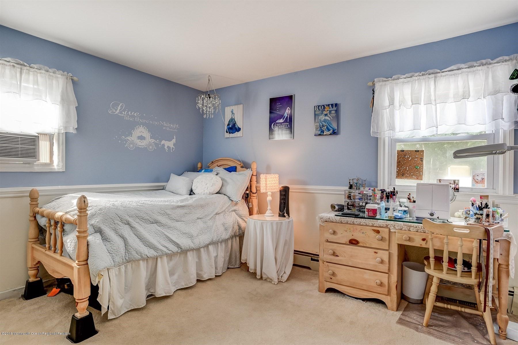 66 Thompson Bridge Road Jackson, NJ 08527 - Photo 26 of 34 a bedroom with a bed and a window