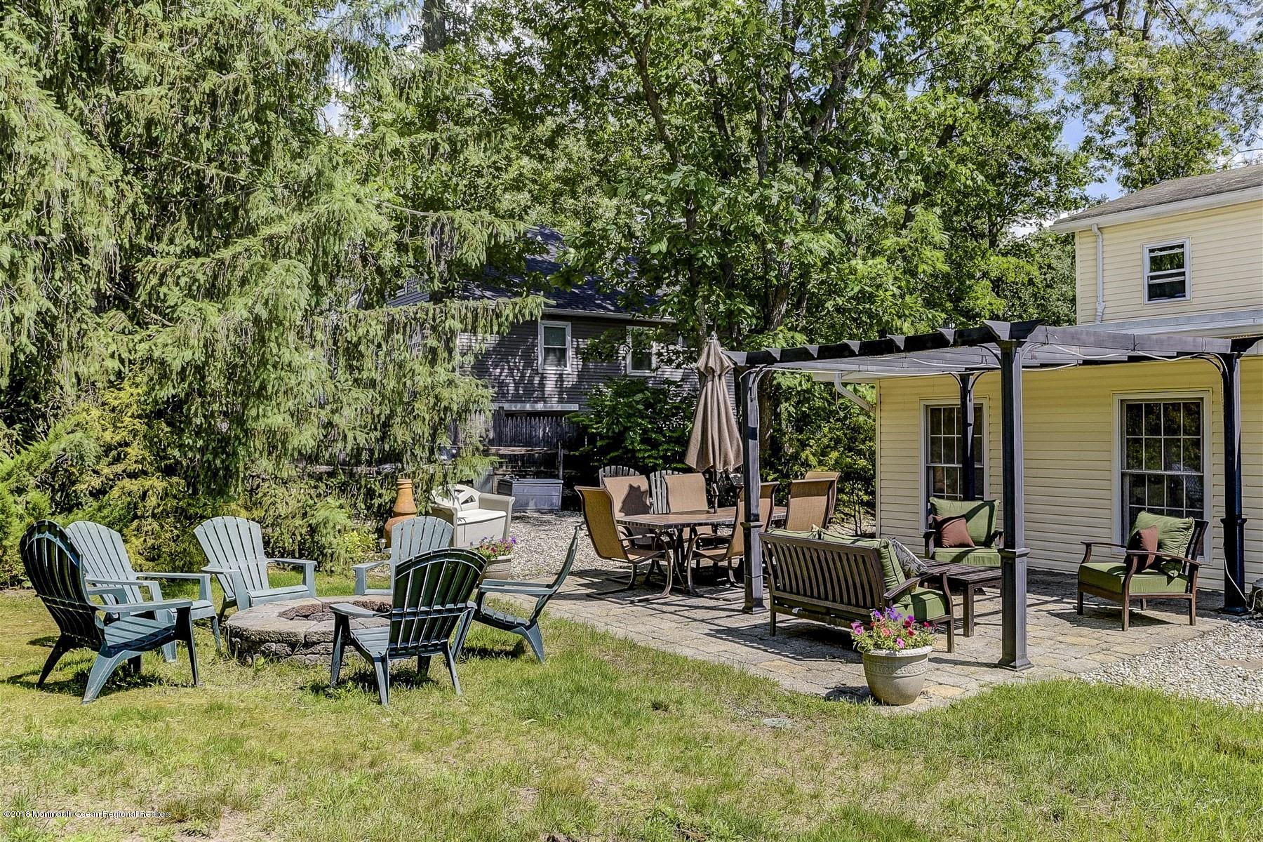 66 Thompson Bridge Road Jackson, NJ 08527 - Photo 32 of 34 a view of a backyard with sitting area