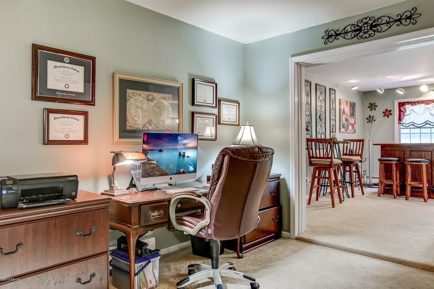66 Thompson Bridge Road Jackson, NJ 08527 - Photo 7 of 34 a work room with furniture and wooden floor