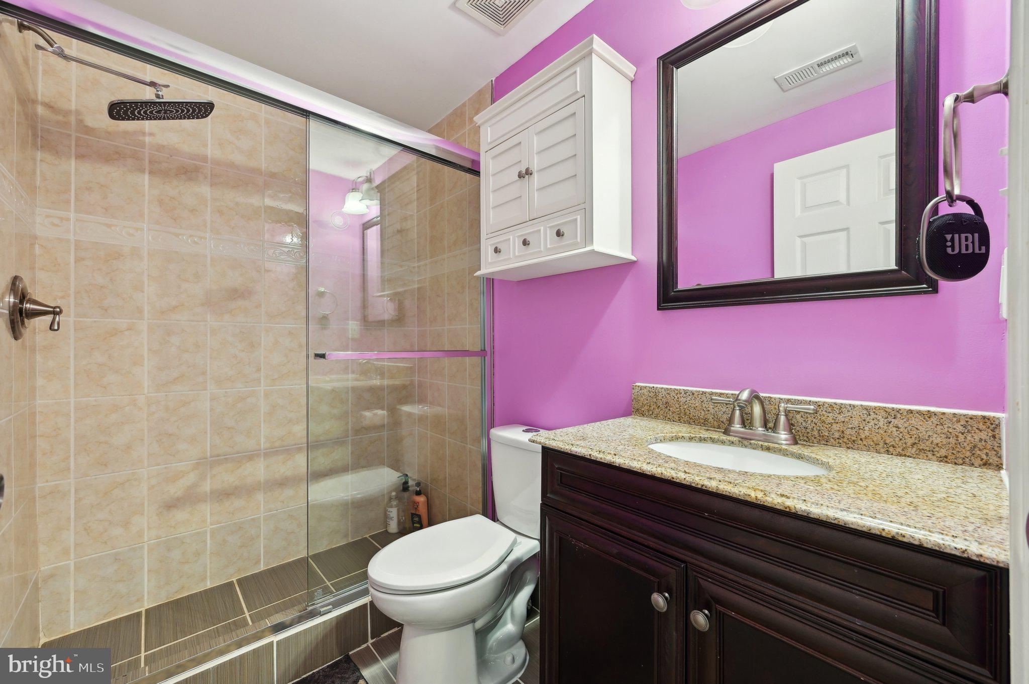 9552 Chaton Road Laurel, MD 20723 - Photo 27 of 53 a bathroom with a sink toilet and shower