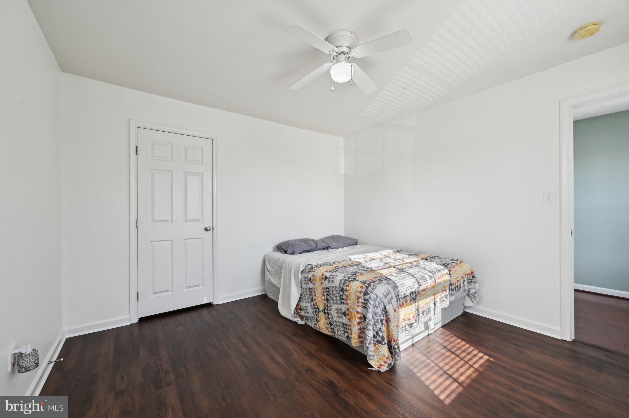 9552 Chaton Road Laurel, MD 20723 - Photo 29 of 53 a bedroom with a bed and a ceiling fan