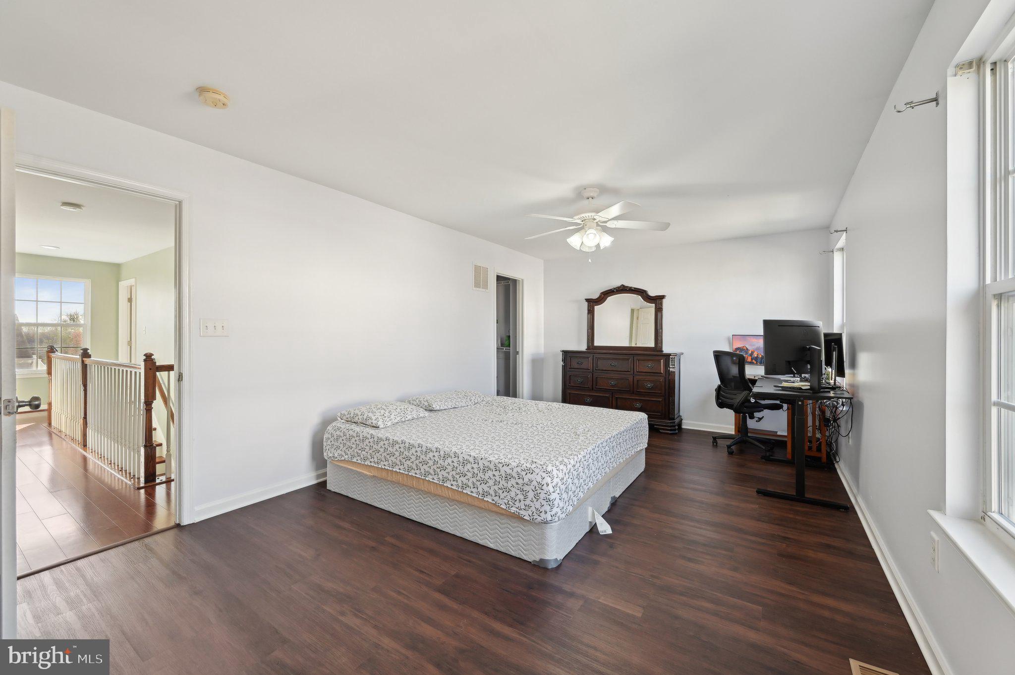 9552 Chaton Road Laurel, MD 20723 - Photo 39 of 53 a living room with a bed furniture and a mirror