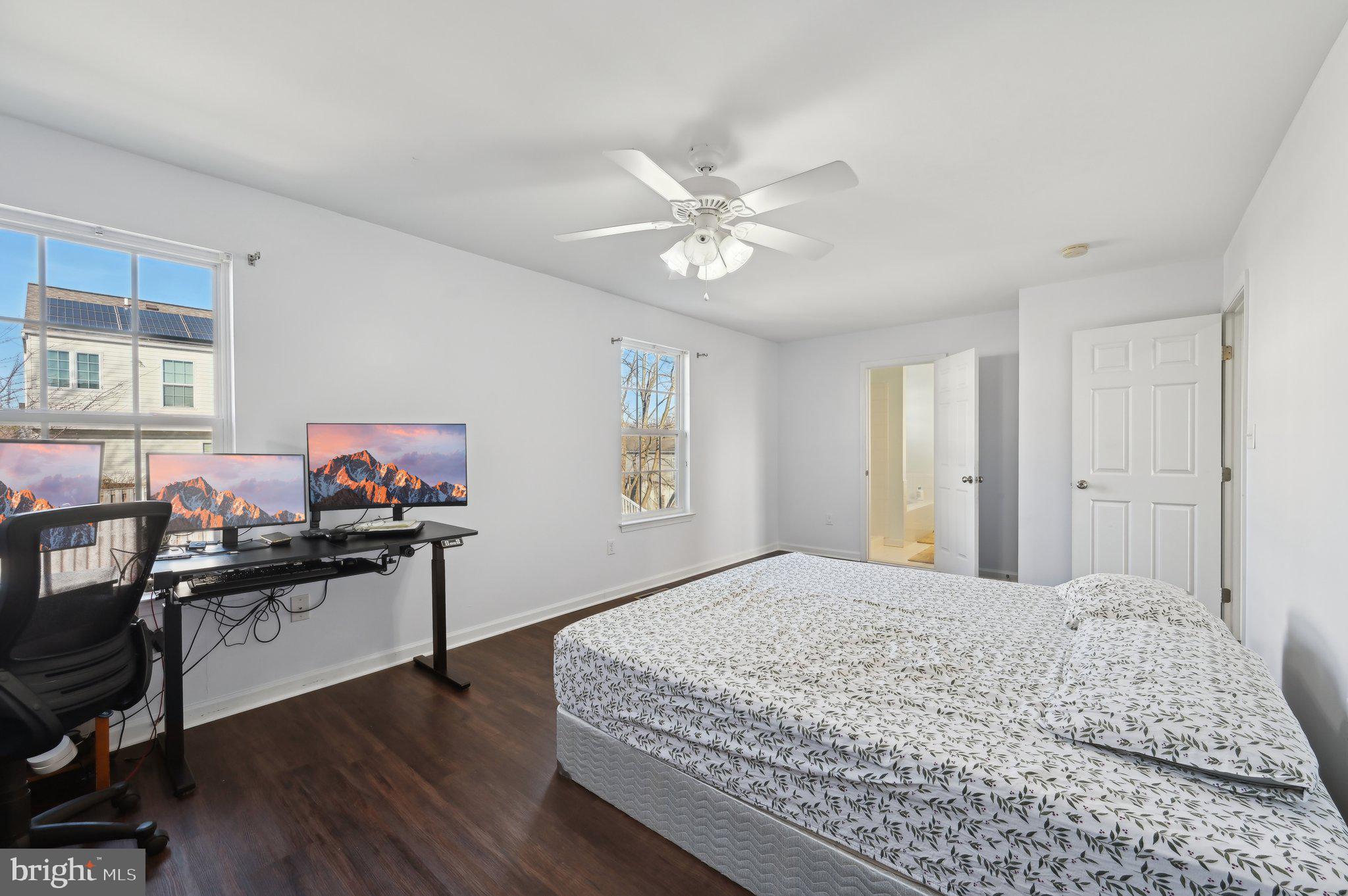 9552 Chaton Road Laurel, MD 20723 - Photo 41 of 53 a bedroom with a bed and a chandelier