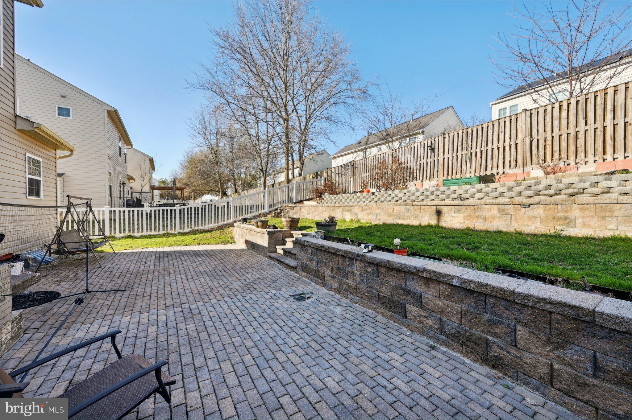 9552 Chaton Road Laurel, MD 20723 - Photo 48 of 53 a view of yard with swimming pool and wooden fence