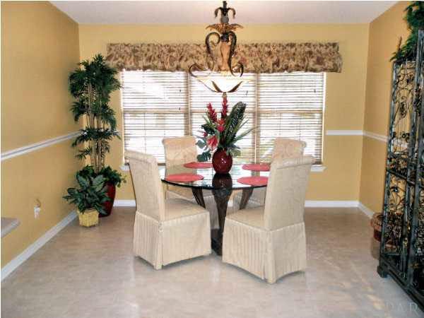 7151 Riverview Road Navarre, FL 32566 - Photo 5 of 18 Beautiful breakfast area with chair-rail