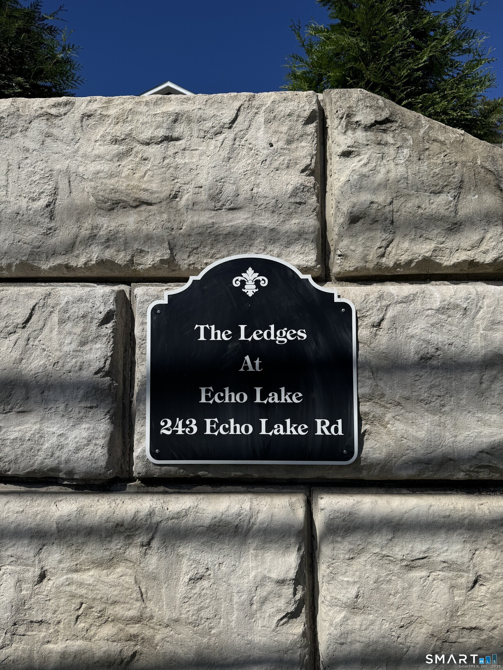 243 Echo Lake Road, Unit B10 Watertown, CT 06795 - Photo 2 of 10 a black and white photo of a park