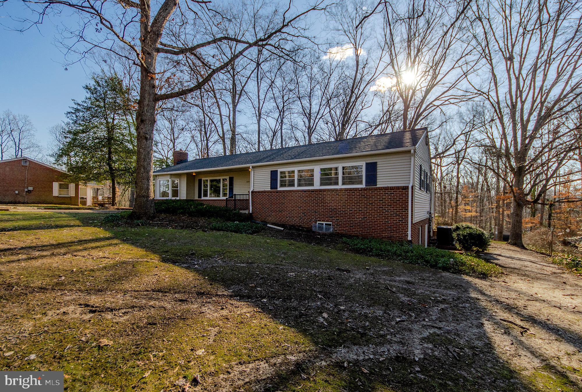 6620 Ridgeway Drive Springfield, VA 22150 - Photo 3 of 37 a view of a house with a yard